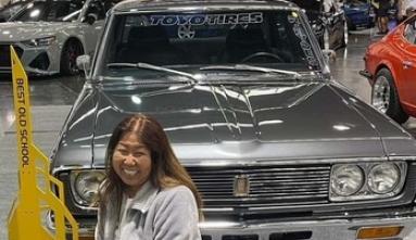 Janet Fujimoto with her award-winning 1970 Toyota Crown,